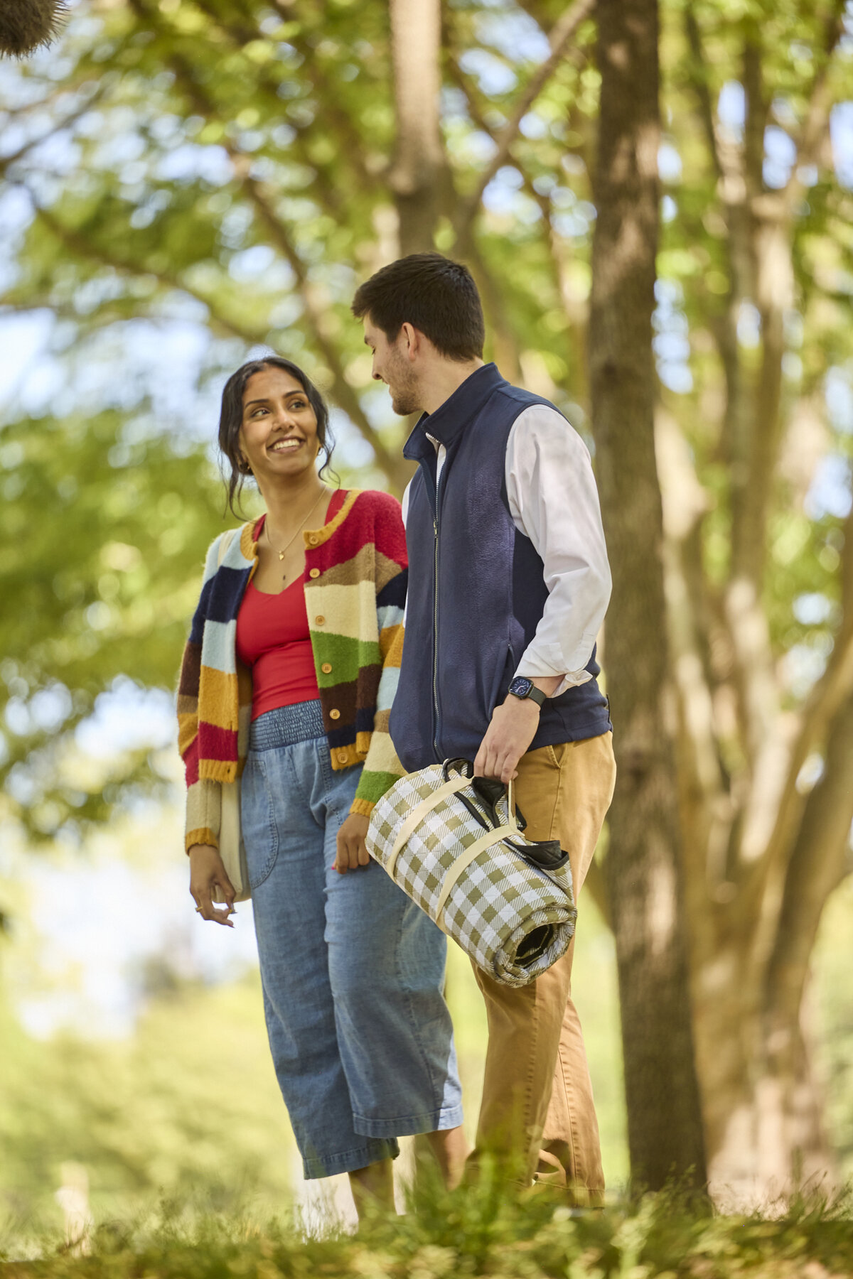 Saanvi looking at Nate on a wooded path